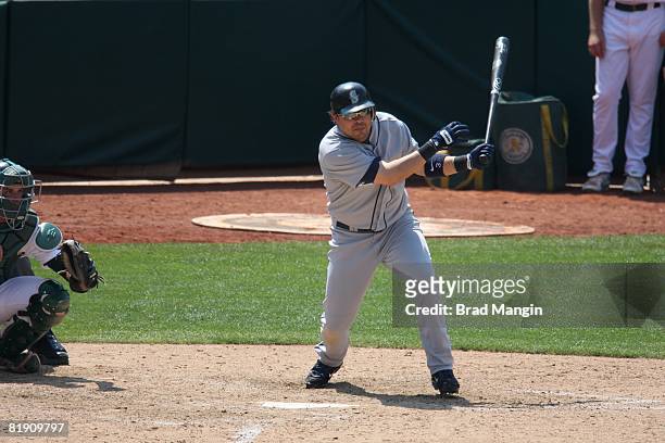 Jose Vidro of the Seattle Mariners bats during the game against the Oakland Athletics at the McAfee Coliseum in Oakland, California on July 10, 2008....