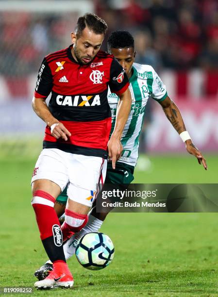 Everton Ribeiro of Flamengo struggles for the ball with Tche Tche of Palmeiras during a match between Flamengo and Palmeiras as part of Brasileirao...