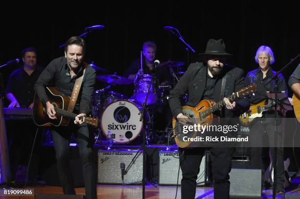 Charles Esten and Colin Linden perform on stage for Charles Esten's #OneSingleYear Celebration Concert at CMA Theater at the Country Music Hall of...