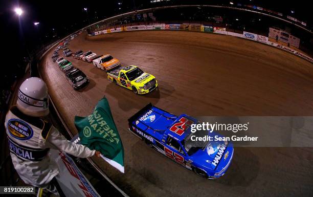 Stewart Friesen, driver of the Halmar International Chevrolet, leads the field during the start of the NASCAR Camping World Truck Series 5th Annual...