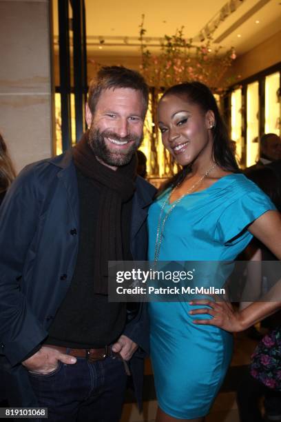 Aaron Eckhart and Shontelle attend MOLLY SIMS Launches GRAYCE by MOLLY SIMS at Henri Bendel on March 23, 2010 in New York City.