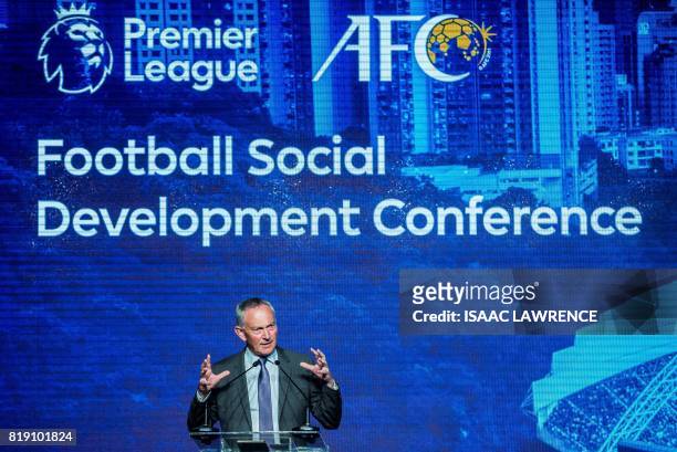 Richard Scudamore, executive chairman of the English Premier League, speaks at a football social development conference in Hong Kong on July 20,...