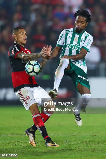 Paolo Guerrero of Flamengo struggles for the ball with Ze Roberto of Palmeiras during a match between Flamengo and Palmeiras as part of Brasileirao...