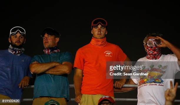 Fans wear googles during the NASCAR Camping World Truck Series 5th Annual Dirt Derby 150 at Eldora Speedway on July 19, 2017 in Rossburg, Ohio.