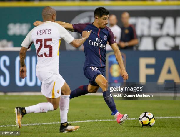 Yuri Berchiche of Paris Saint-Germain drives on the goal against Bruno Peres of AS Roma during the second half at Comerica Park on July 19, 2017 in...