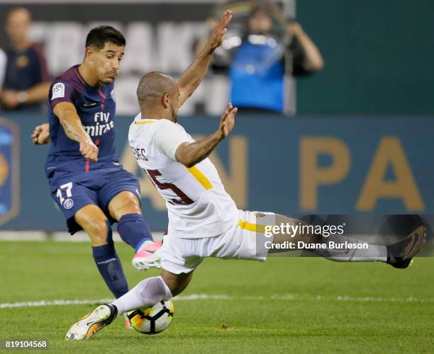 Bruno Peres of AS Roma defends a shot on goal by Yuri Berchiche of Paris Saint-Germain during the second half at Comerica Park on July 19, 2017 in...