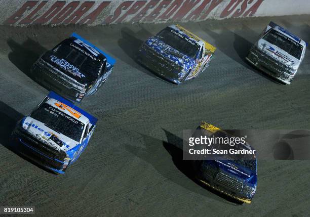 Trucks race during the NASCAR Camping World Truck Series 5th Annual Dirt Derby 150 at Eldora Speedway on July 19, 2017 in Rossburg, Ohio.