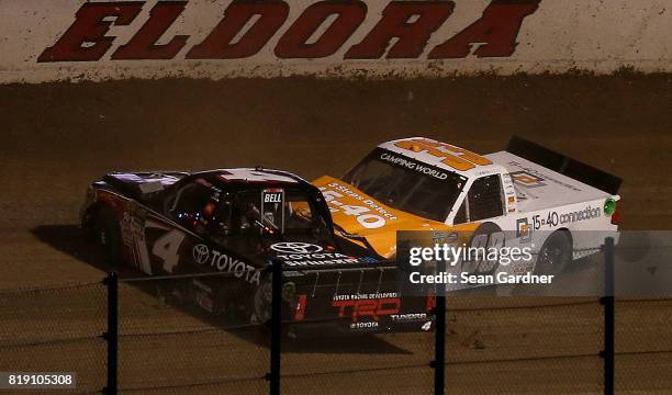 Christopher Bell, driver of the Toyota, and Kaz Grala, driver of the 15-40 Connection Chevrolet, wreck during the NASCAR Camping World Truck Series...