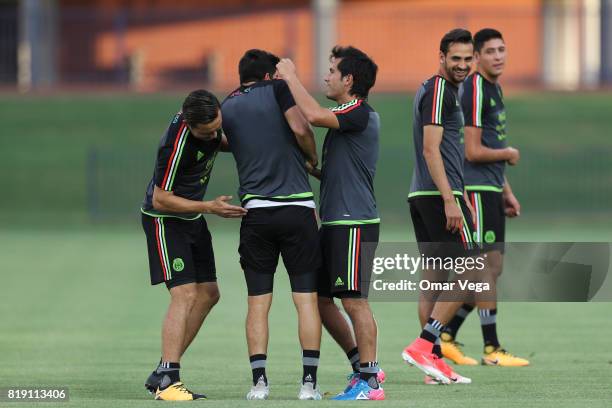 Players of Mexico make jokes during the Mexico National Team training session ahead it's match against Honduras at Grand Canyon University on July...