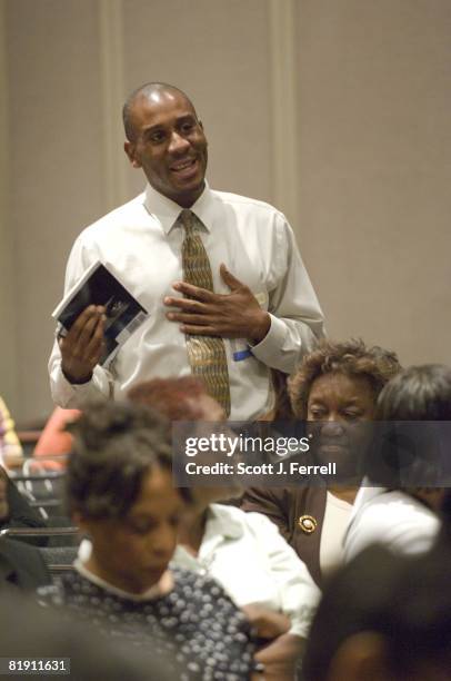 City College of New York student Leslie Ducena thanks House Ways and Means Chairman Charles B. Rangel, D-N.Y., during a question-and-answer session...