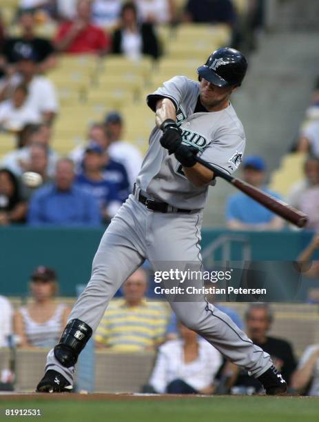 Jeremy Hermida of the Florida Marlins hits a 2 run home run during the first inning of the game against the Los Angeles Dodgers at Dodger Stadium on...