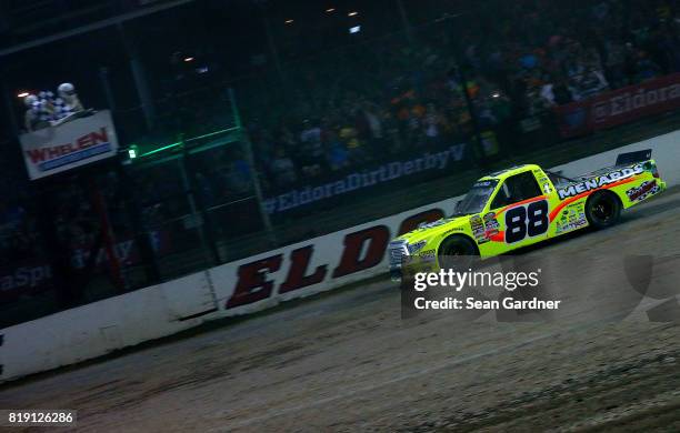 Matt Crafton, driver of the Ideal Door/Menards Toyota, wins the NASCAR Camping World Truck Series 5th Annual Dirt Derby 150 at Eldora Speedway on...