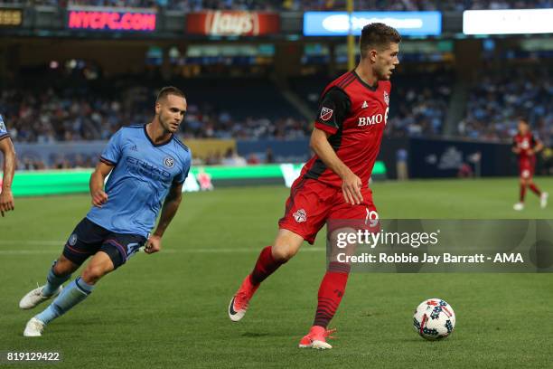 Maxime Chanot of New York City and Ben Spencer of Toronto FC during MLS fixture between Toronto FC and New York City FC at Yankee Stadium on July 19,...