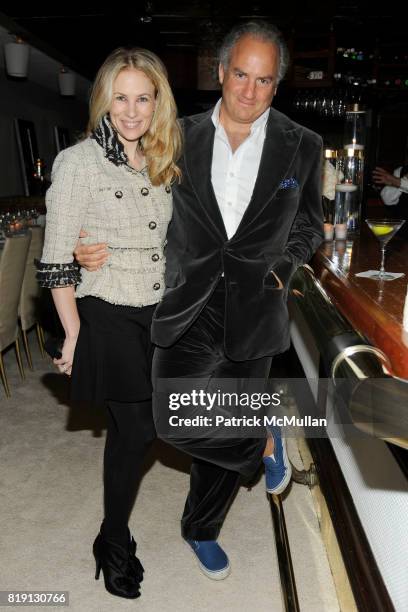 Rebekah McCabe and Charles Finch attend CHANEL and CHARLES FINCH Pre-Oscar Dinner at Madeo Restaurant on March 6, 2010 in Beverly Hills, California.