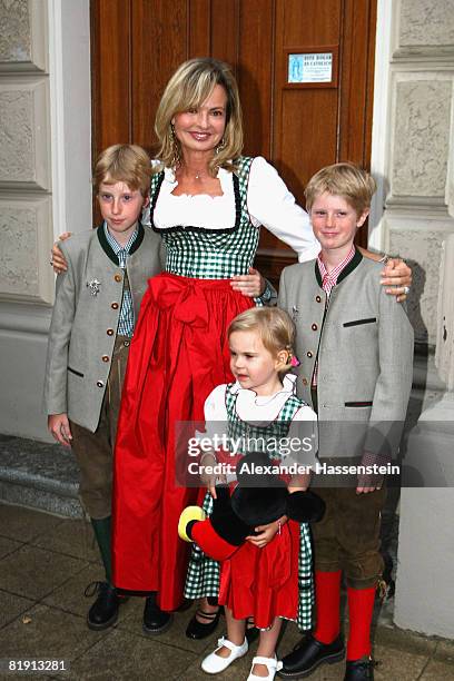 Maya Flick attends with her daughter Charlotta Flick the opera 'Carmen' at the Thurn und Taxis castle festival on July 11 in Regensburg, Germany.