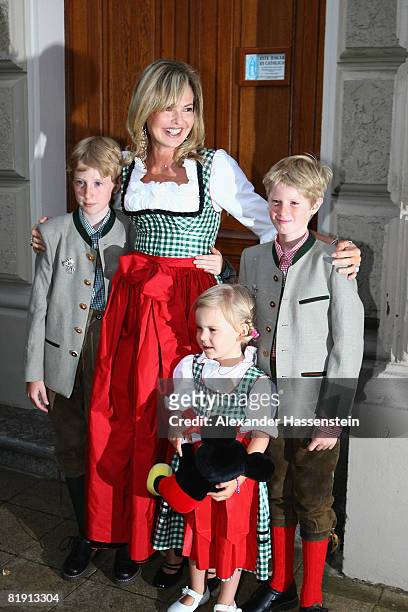 Maya Flick attends with her daughter Charlotta Flick the opera 'Carmen' at the Thurn und Taxis castle festival on July 11 in Regensburg, Germany.