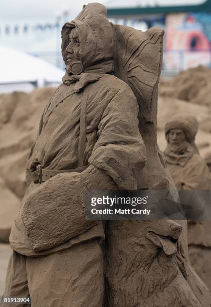 Sand sculptures are displayed at the Sand Sculpture Festival as it opens to the public on July 12 2008 in Weston Super Mare, England. Sand artists...