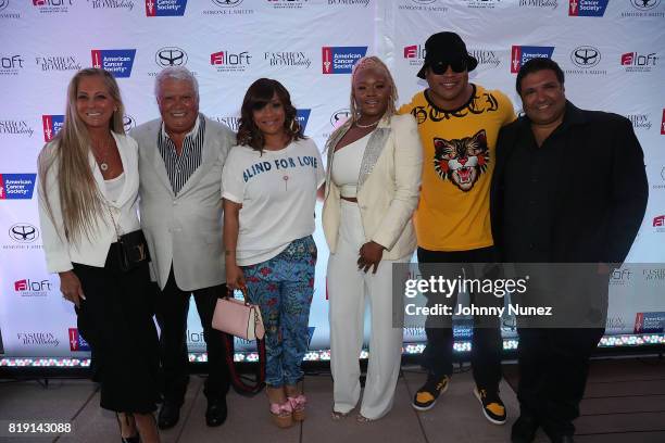 Gila Seliktar, Nissim Seliktar, Simone I. Smith, Claire Sulmers, LL Cool J and Ronny Seliktar attend A Toast To Summer Hosted By Simone I. Smith at...