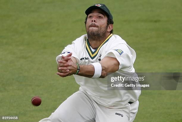 Nottinghamshire's Andre Adams drops a catch which would have dismissed Surrey's Mark Ramprakash for 23 runs during the LV County Championship...