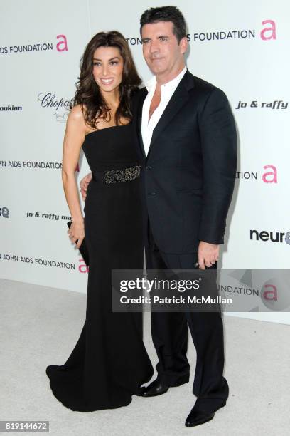 Mezhgan Hussainy and Simon Cowell attend 18th Annual ELTON JOHN AIDS Foundation Oscar Party at Pacific Design Center on March 7, 2010 in West...