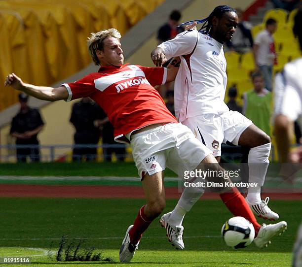 Sergei Ignashevich of FC Spartak Moscow competes for the ball with Vagner Love of PFC CSKA Moscow during the Russian Football League Championship...