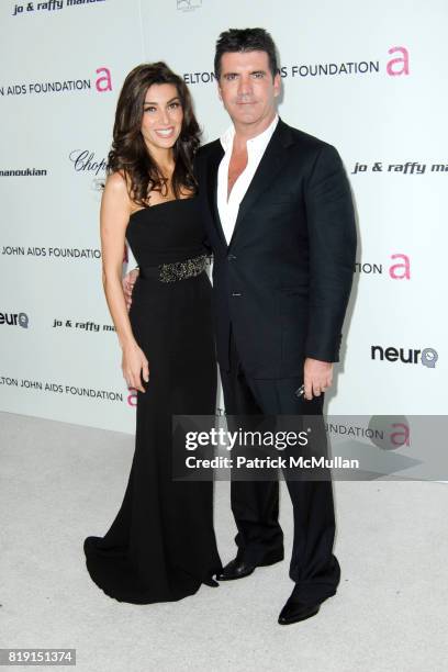 Mezhgan Hussainy and Simon Cowell attend 18th Annual ELTON JOHN AIDS Foundation Oscar Party at Pacific Design Center on March 7, 2010 in West...