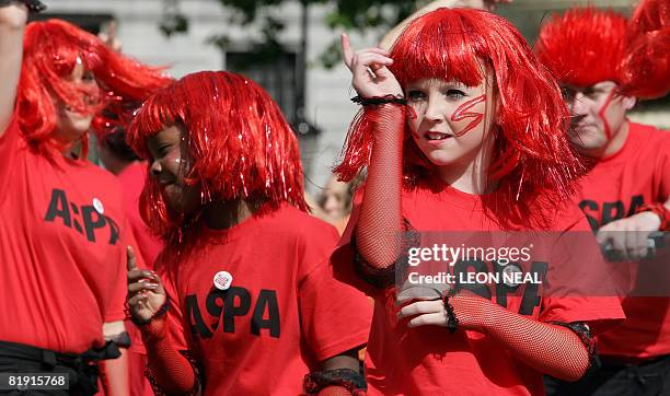 People dance as 2008 people, dressed in red, yellow and blue participated in the world's largest dance, The Big Dance, a specially commissioned new...