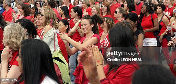 People dance as 2008 people, dressed in red, yellow and blue participated in the world's largest dance, The Big Dance, a specially commissioned new...