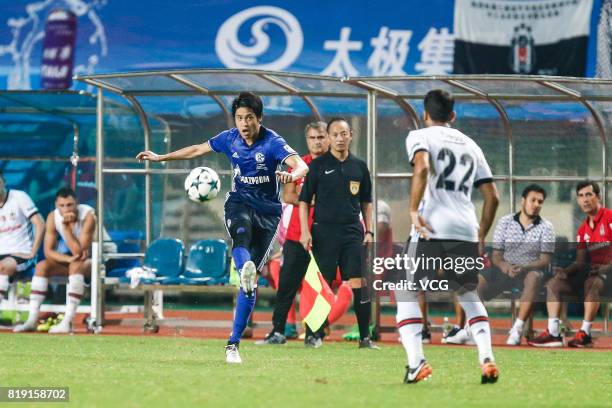 Atsuto Uchida of FC Schalke 04 and Aras Ozbiliz of Besiktas comepte for the ball during the 2017 International soccer match between Schalke 04 and...