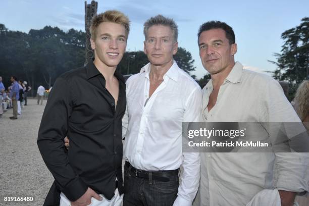 Nick Gruber, Calvin Klein and Andre Balazs attend Paradiso: The 17th Annual Watermill Summer Benefit 2010 at Watermill Center on July 24, 2010.