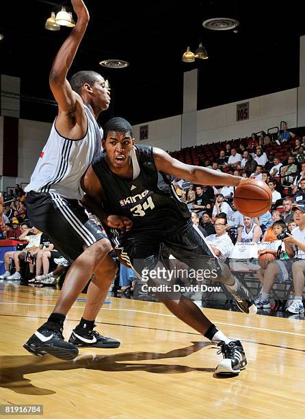 Jason Thompson of the Sacramento Kings drives the basketball against the Toronto Raptors during the NBA Summer League presented by EA Sports at COX...