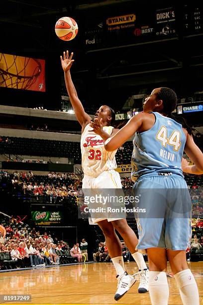 Ebony Hoffman of the Indiana Fever shoots over Chasity Melvin of the Chicago Sky at Conseco Fieldhouse on July 12, 2008 in Indianapolis, Indiana....