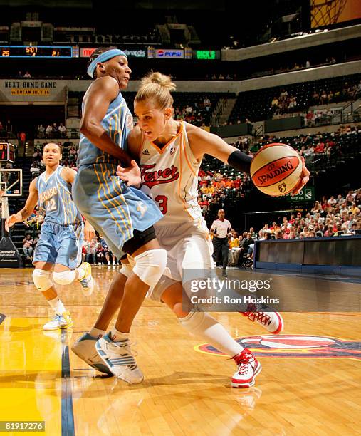 Katie Douglas of the Indiana Fever drives on Dominique Chanty of the Chicago Sky at Conseco Fieldhouse on July 12, 2008 in Indianapolis, Indiana....