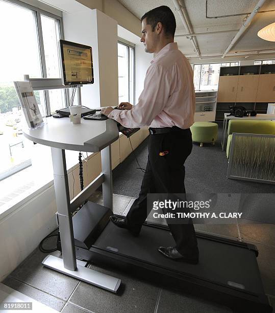 By Rob Lever, Lifestyle-US-labor-health-technology James Brewer with Details, a unit of Michigan-based office furniture maker Steelcase, shows off...