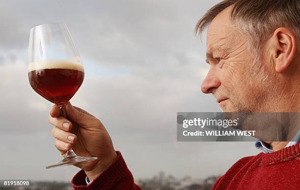 Lifestyle-Australia-drink-beer, by Neil Sands Carlton's master brewer John Cozens inspects a glass of the Carlton & United Breweries' Crown...