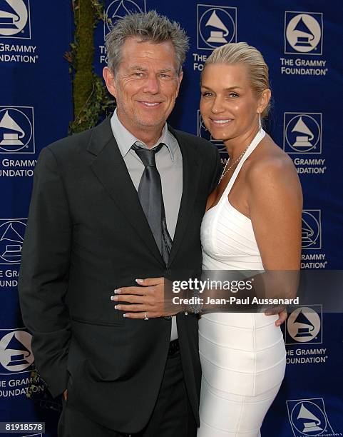 Producer David Foster and guest arrive at the GRAMMY Foundation Starry Night held at the University of Southern California on July 12th, 2008 in Los...