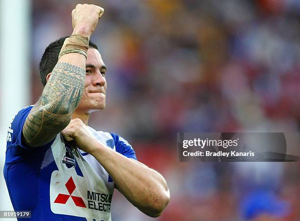 Sonny Bill Williams celebrates victory as the full time siren sounds in the round 18 NRL match between the Brisbane Broncos and the Bulldogs at...