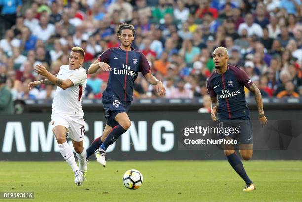 Roma Juan Iturbe vies with Paris Saint-Germain midfielder Adrien Rabiot in the first half during an International Champions Cup match between AS Roma...