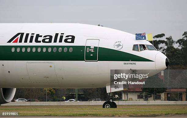 In this handout image provided by World Youth Day the Alitalia boeing 737 aircraft carrying His Holiness Pope Benedict XVI arrives at the Richmond...