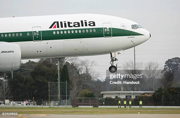 In this handout image provided by World Youth Day the Alitalia boeing 737 aircraft carrying His Holiness Pope Benedict XVI arrives at the Richmond...