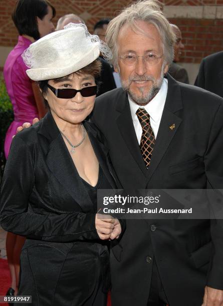 Yoko Ono and Neil Portnow arrive at the GRAMMY Foundation Starry Night held at the University of Southern California on July 12th, 2008 in Los...