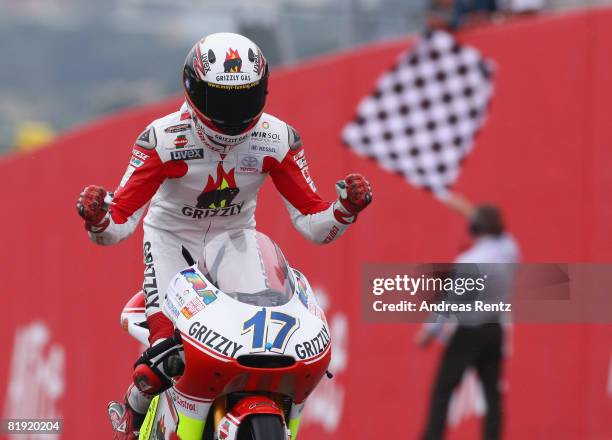 Stefan Bradl of Germany and the Grizzly Gas Kiefer Racing Team celebrate his second place during the 125cc race of the Grand Prix of Germany at...