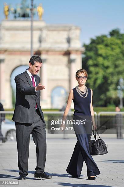Syrian President Bashar al-Assad's wife Asma al-Assad is welcomed by the Louvre Museum's President Henri Loyrette before visiting the Louvre on July...