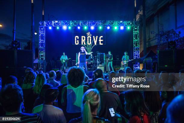 Jesse Valenzuela, Robin Wilson, Scott Hessel, Bill Leen and Scott Johnson of the Gin Blossoms perform onstage during The Grove's Summer Concert...