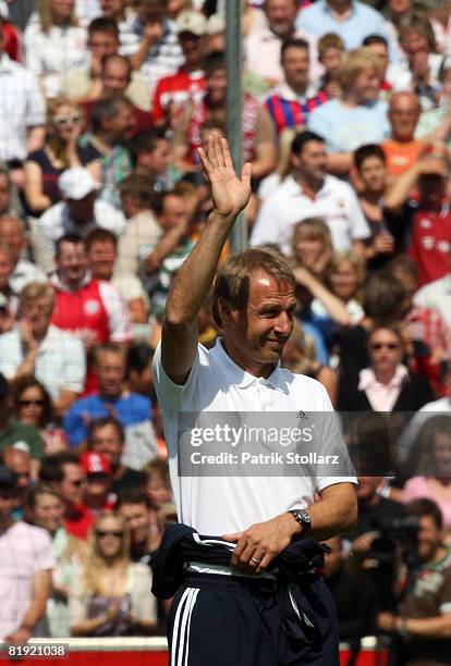 Juergen Klinsmann of Munich waves prior a friendly match between SV Lippstadt 08 and FC Bayern Munich at the 'Am Waldschloesschen' stadium on July...