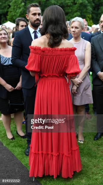 Catherine, Duchess of Cambridge attendS The Queen's Birthday Party at the British Ambassadorial Residenceduring an official visit to Poland and...