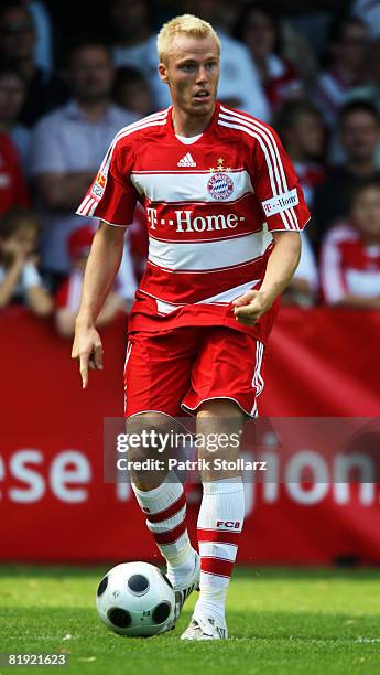 Christian Lell of Munich runs with the ball during a friendly match between SV Lippstadt 08 and FC Bayern Munich at the 'Am Waldschloesschen' stadium...