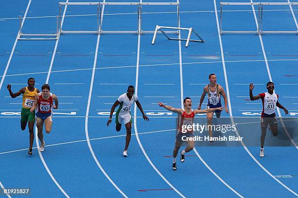 Konstantin Shabanov of Russia celebrates his win in the final of the men's 110m hurdles from 2nd placed Booker Nunley of USA and 3rd place Keiron...