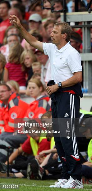 Juergen Klinsmann of Munich gestures during a friendly match between SV Lippstadt 08 and FC Bayern Munich at the 'Am Waldschloesschen' stadium on...