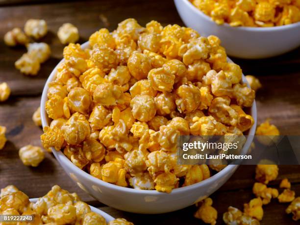 chicago style popcorn, caramel and cheddar mix - caramel popcorn stock pictures, royalty-free photos & images